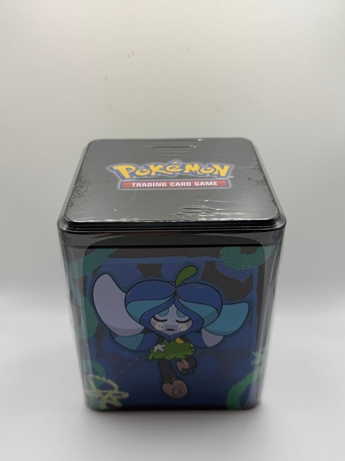 JCC Pokémon: Lata Apilable - Ogerpon / Máscara Pozofundamental